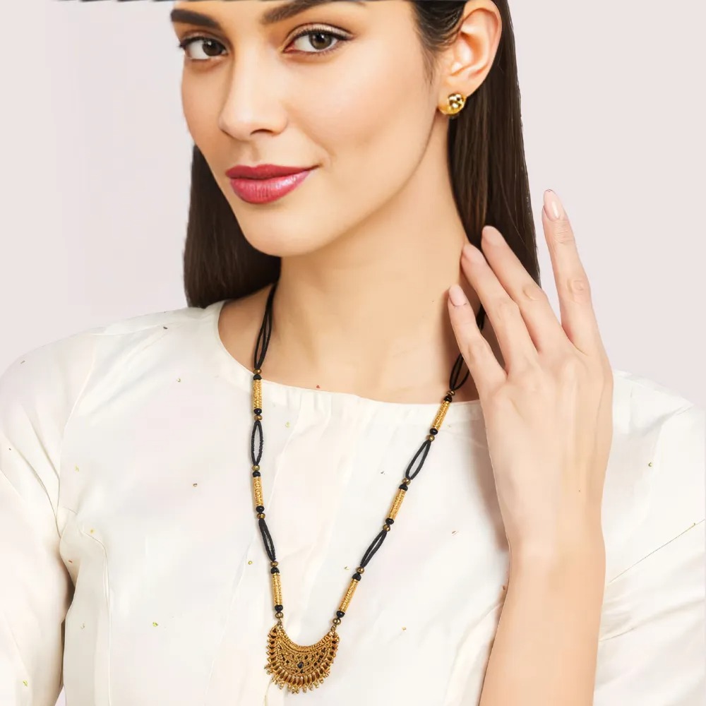 Ejwj1WvyapInxAJ560UDXd7HG0711FOTws5eBM5n.jpg Divine Harmony Gold Mangalsutra - Image 1