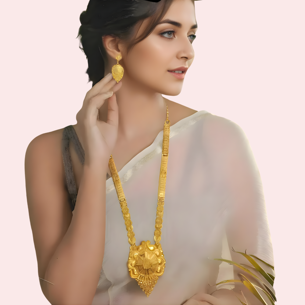 U0rtWVNt1UCtqcbUo7y62VPaI1OK1RxEGokFvq7Z.png Classic Bridal Gold Long Necklace Set with Pendant, Earrings & Maang Tikka - Image 1